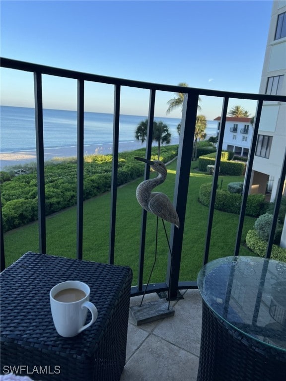 balcony featuring a water view