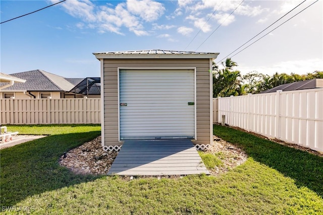 view of outdoor structure with a yard