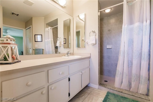 bathroom featuring vanity and a shower with curtain