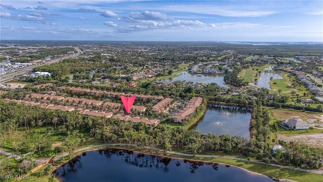 drone / aerial view with a water view