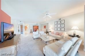 living room with ceiling fan