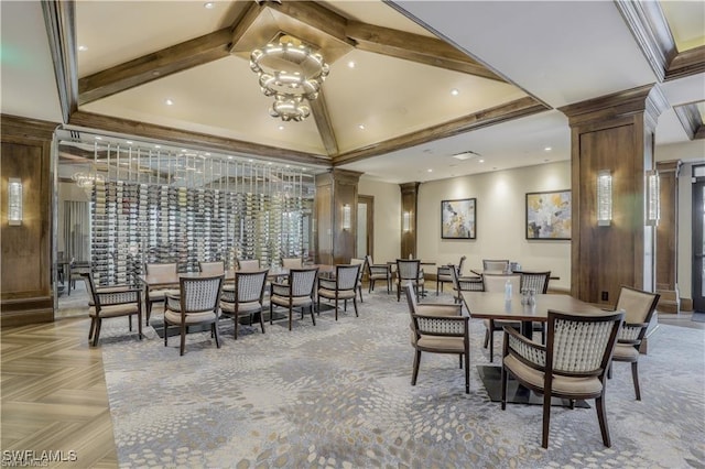 dining space with a chandelier, beamed ceiling, ornate columns, high vaulted ceiling, and recessed lighting