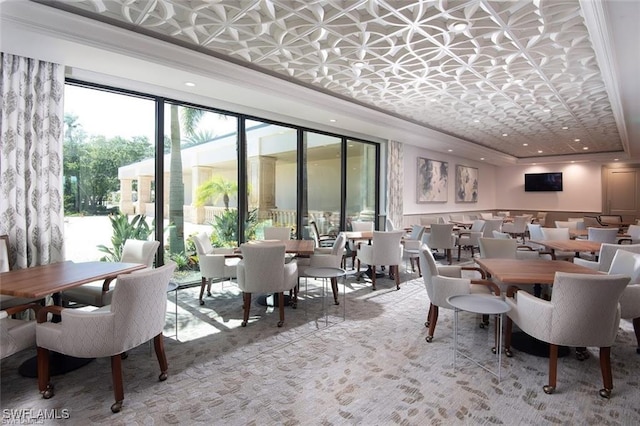 dining area with an ornate ceiling, crown molding, and recessed lighting