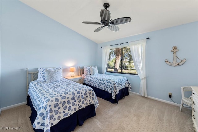 carpeted bedroom with ceiling fan and lofted ceiling