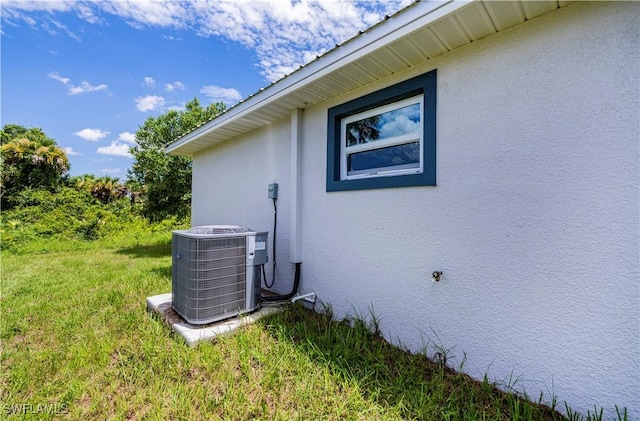 view of property exterior with cooling unit