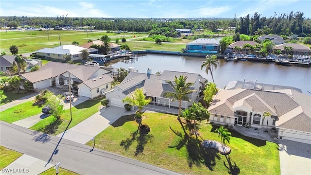 bird's eye view with a water view