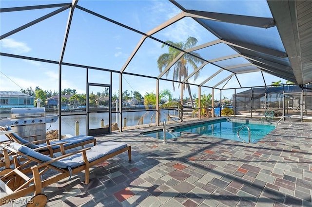 view of swimming pool with a lanai, a patio area, a water view, and grilling area