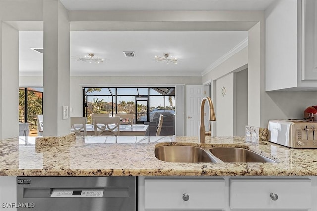 kitchen featuring light stone countertops, ornamental molding, sink, dishwasher, and white cabinetry