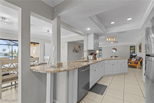 kitchen featuring crown molding, sink, appliances with stainless steel finishes, white cabinetry, and kitchen peninsula