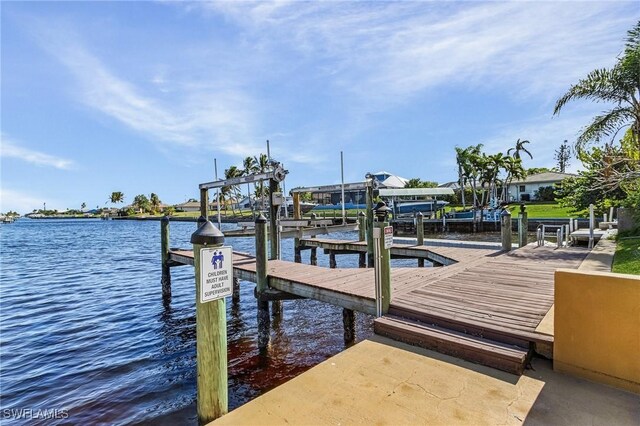 view of dock featuring a water view