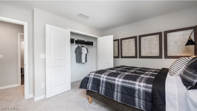 carpeted bedroom with a closet