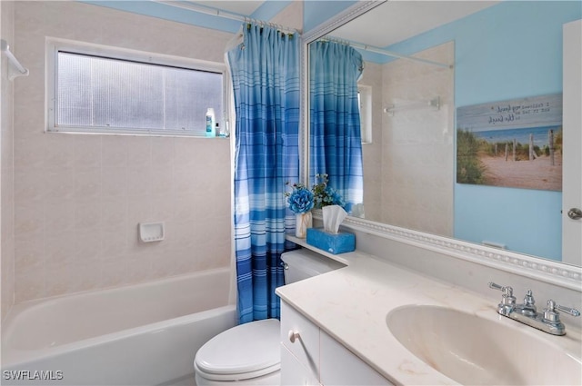 full bathroom featuring shower / tub combo with curtain, vanity, and toilet