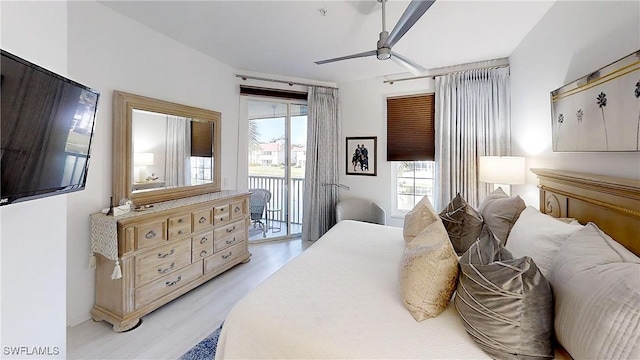 bedroom featuring light wood-type flooring, access to outside, and ceiling fan