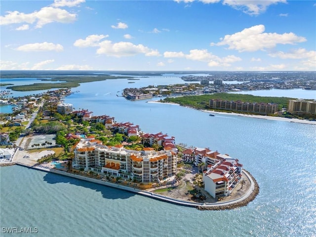 bird's eye view with a water view