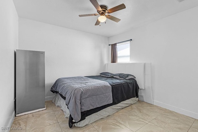 bedroom featuring ceiling fan