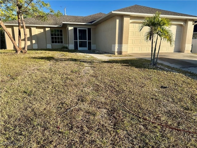 exterior space featuring a lawn and a garage