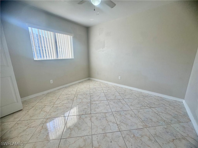 spare room featuring ceiling fan