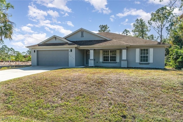 single story home with covered porch, a garage, and a front lawn