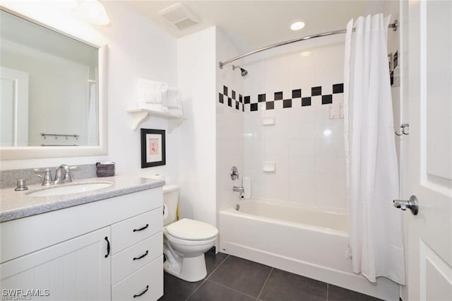 full bathroom featuring tile patterned floors, shower / bath combination with curtain, toilet, and vanity