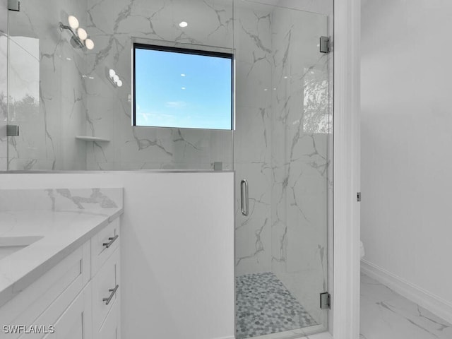 bathroom featuring a marble finish shower, marble finish floor, vanity, and toilet