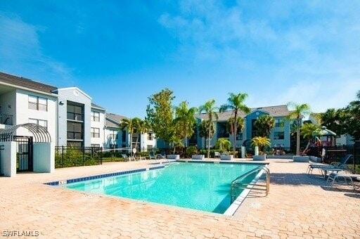 view of swimming pool featuring a patio