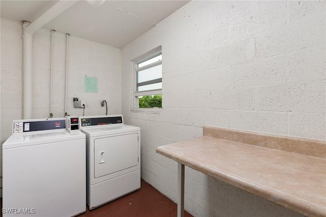 washroom featuring independent washer and dryer