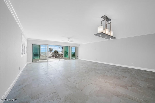 interior space with ceiling fan and crown molding