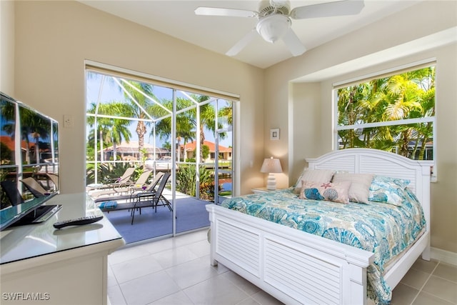 bedroom featuring ceiling fan, access to exterior, and light tile patterned floors