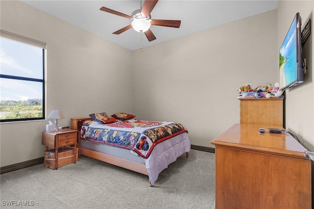 bedroom featuring ceiling fan and carpet floors