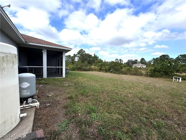 view of yard with a sunroom