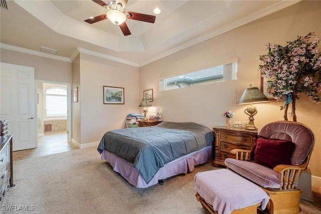 bedroom with ceiling fan, light colored carpet, ornamental molding, and ensuite bathroom