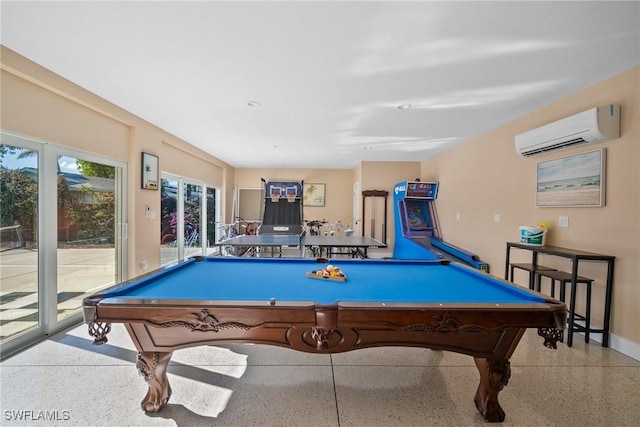 rec room with billiards and a wall unit AC