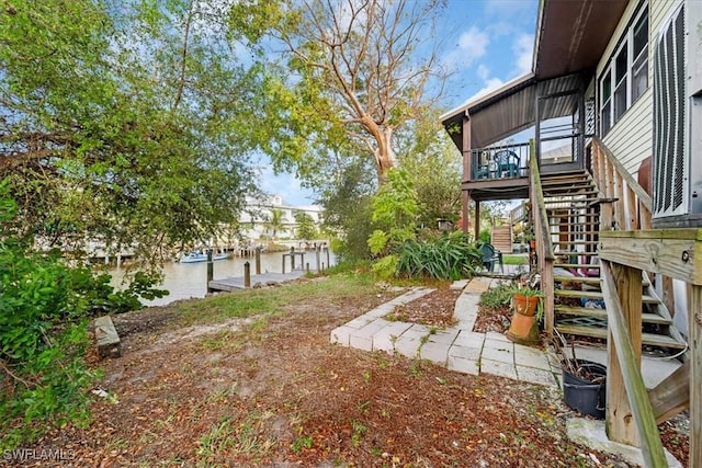 view of yard with a water view