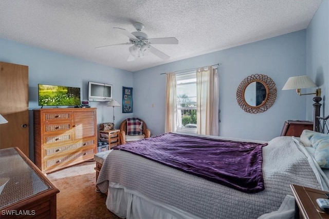 1291 Chokoloskee Dr, Chokoloskee, FL 34138 - bedroom featuring a textured ceiling and ceiling fan