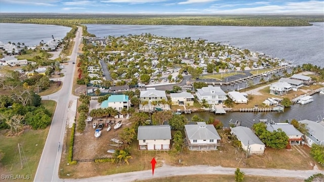 1291 Chokoloskee Dr, Chokoloskee, FL 34138 - drone / aerial view with a water view