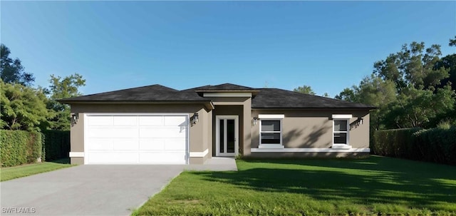 view of front of house featuring a garage and a front lawn