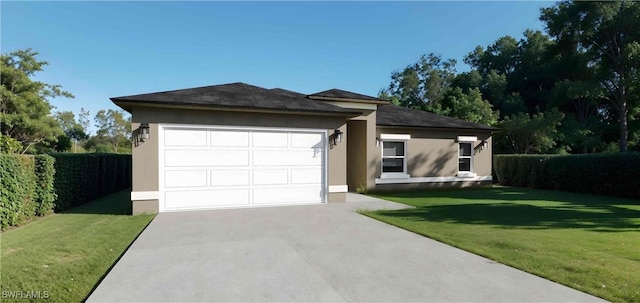 ranch-style house with a garage and a front lawn