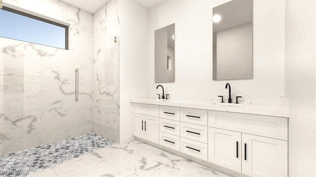 bathroom featuring a tile shower and vanity