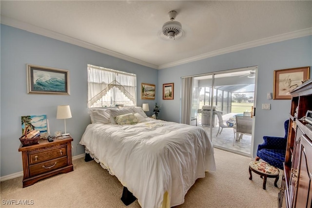 carpeted bedroom with access to outside and crown molding