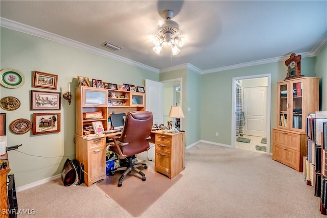 office area featuring ceiling fan, crown molding, and light colored carpet