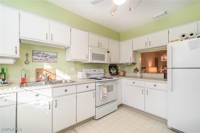 kitchen with white cabinets, ceiling fan, white appliances, and sink