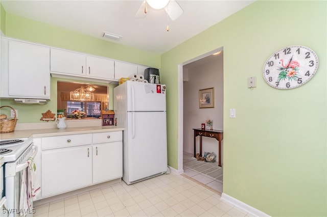 kitchen with ceiling fan, white cabinets, and white appliances