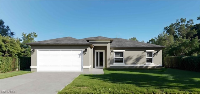 prairie-style house with a garage and a front yard