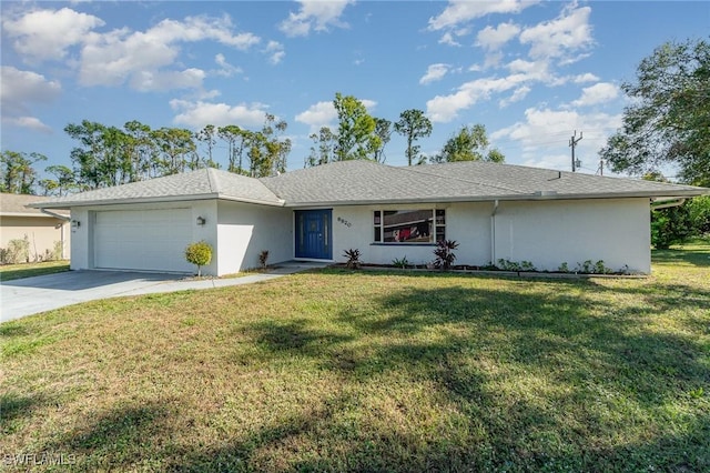 ranch-style house with a garage and a front yard