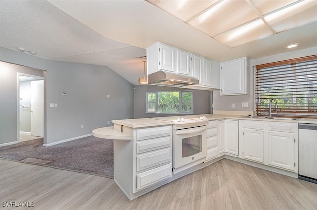 kitchen featuring sink, white cabinets, stainless steel dishwasher, and white electric stove