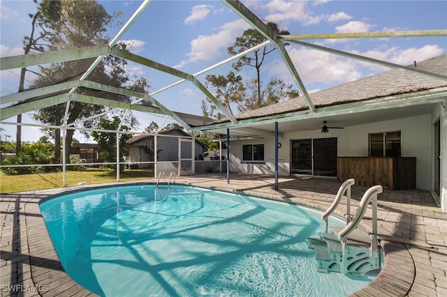 view of pool with a lanai and a patio area