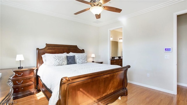 bedroom with ceiling fan, light hardwood / wood-style floors, ornamental molding, and connected bathroom