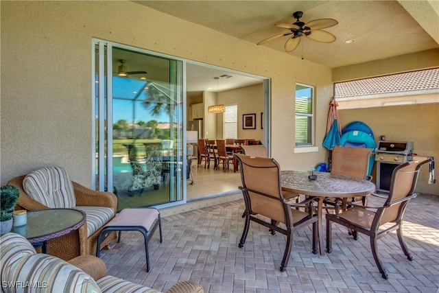 view of patio with ceiling fan