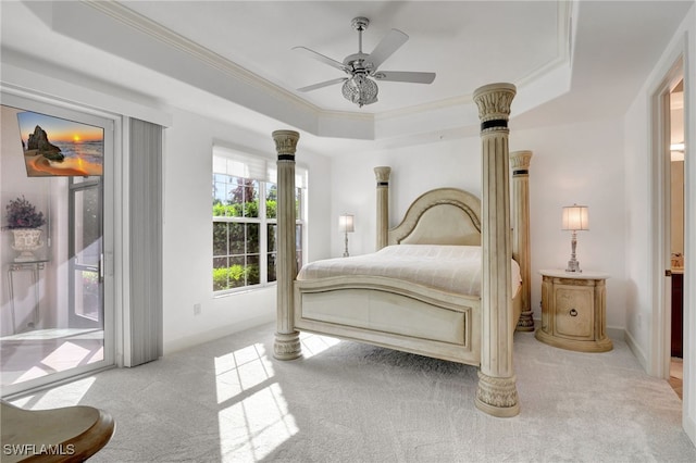 bedroom featuring access to outside, a raised ceiling, ceiling fan, light colored carpet, and crown molding