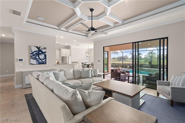 living room featuring ceiling fan, crown molding, and coffered ceiling